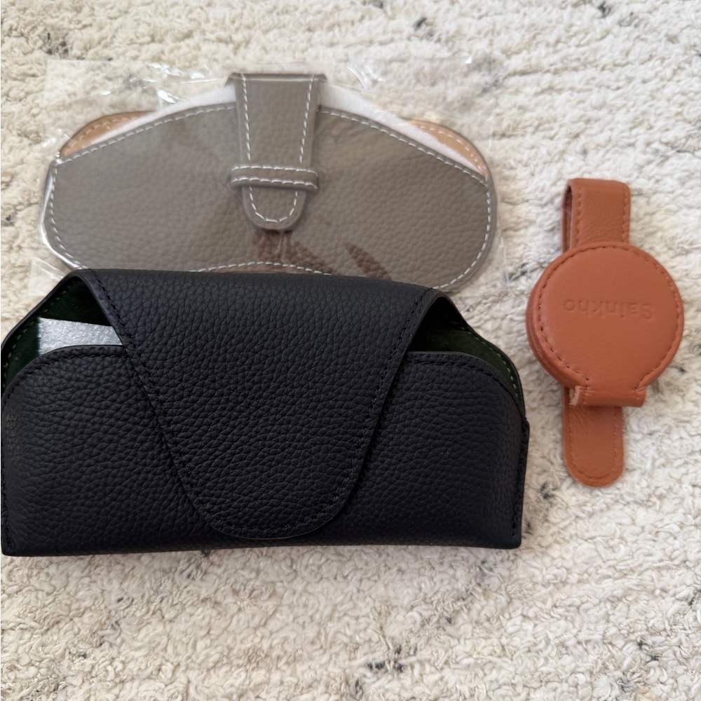 Black Sunglasses Case and Brown Leather Tag/ clipper
